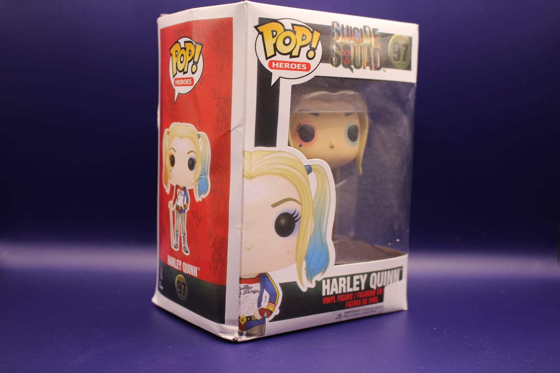 Harley Quinn Funko in box, diagonal front view facing right
