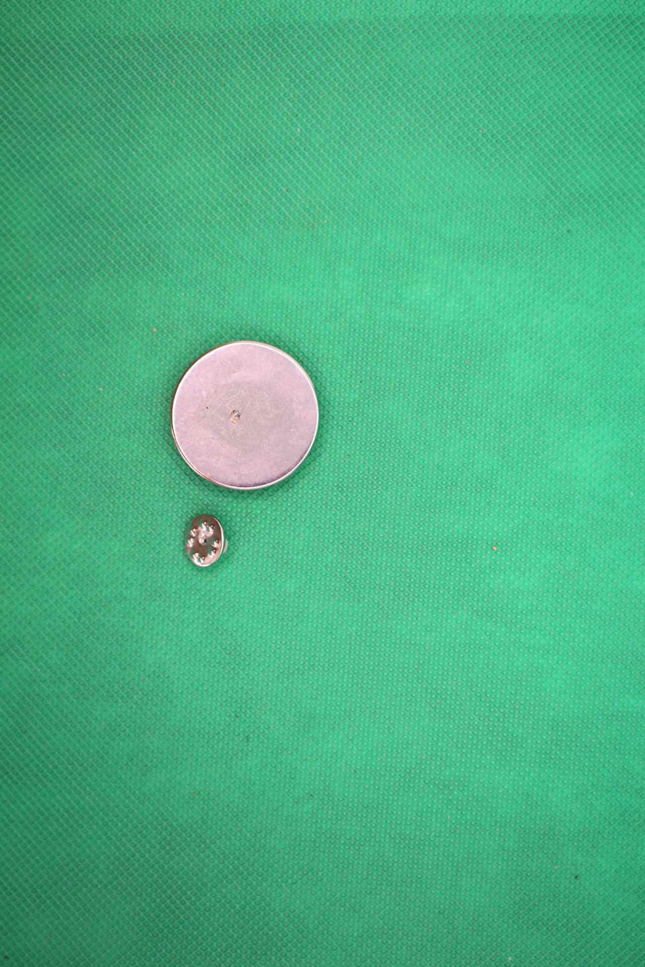 FIFA World Cup 2026 mascot pin, back view, with backing of pin pulled off