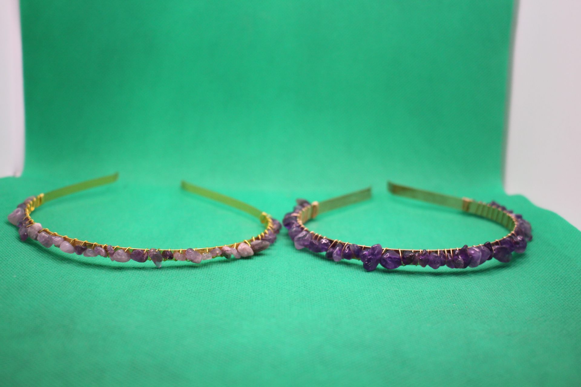 side-by-side comparison of amethyst crystal headbands, with new headband on the left, and focus on the top of the headbands
