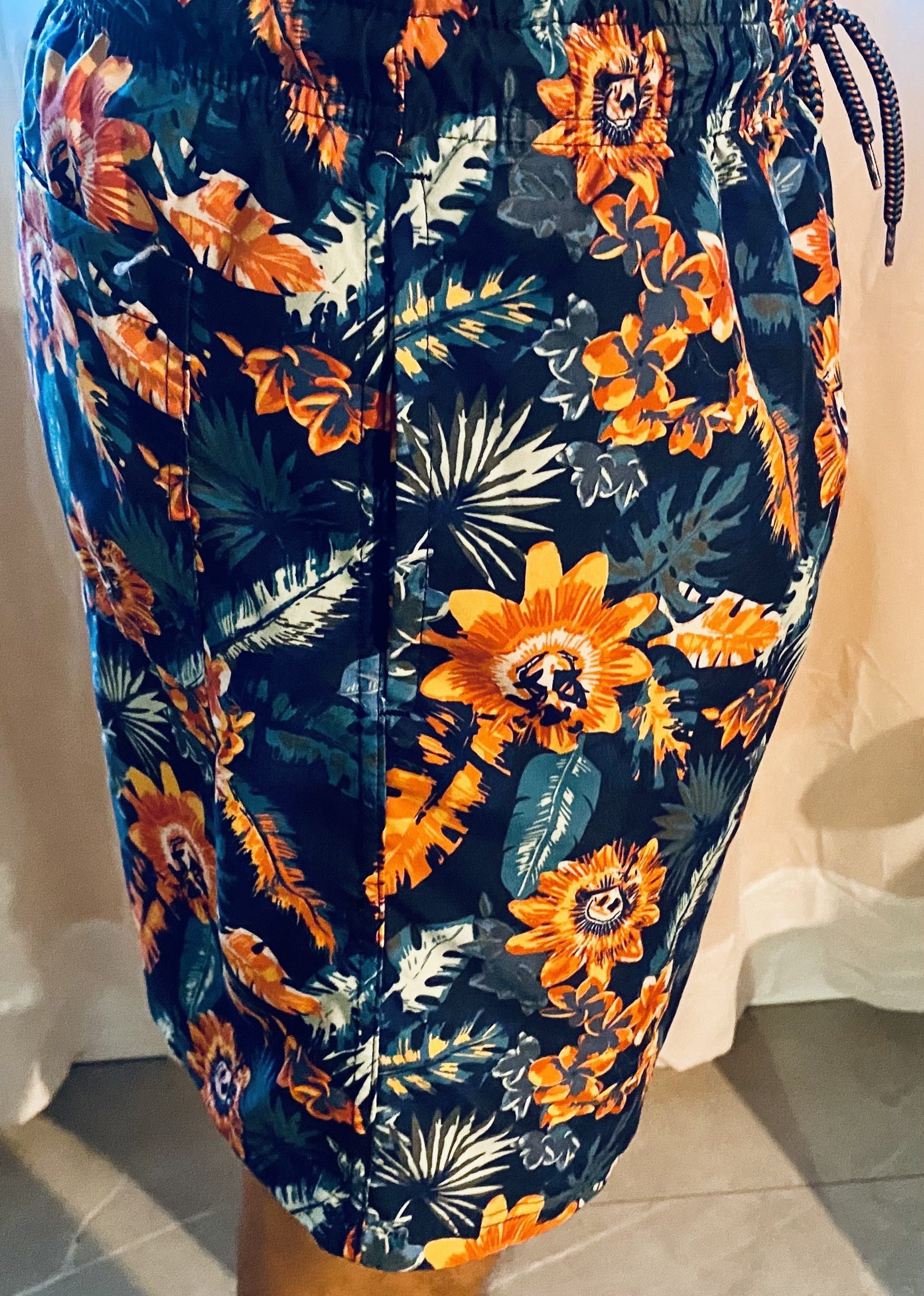 board shorts from the right side, modeled by The Adventurer