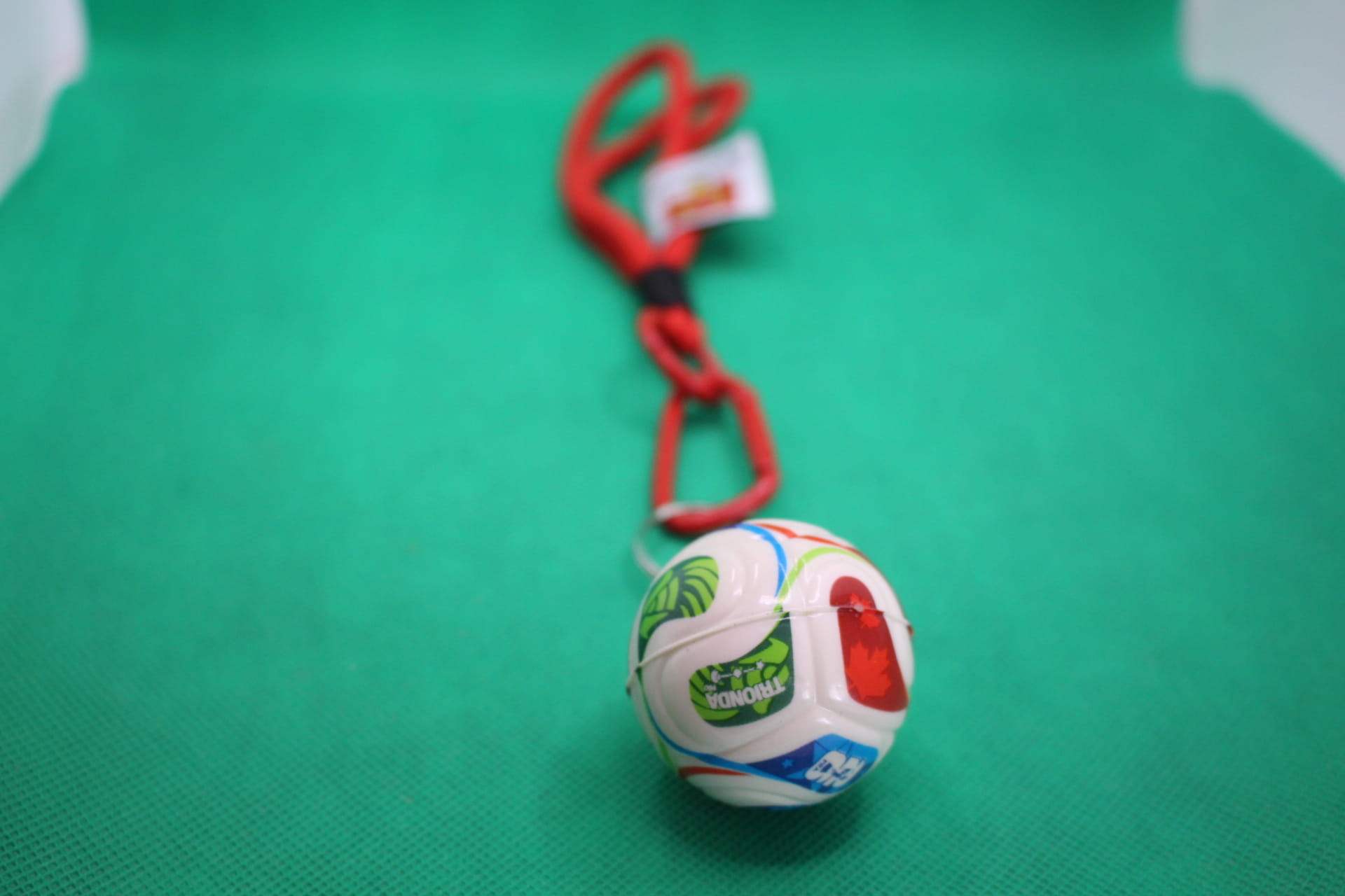 FIFA World Cup 2026 ball keychain, soccer ball focus, full-length front view