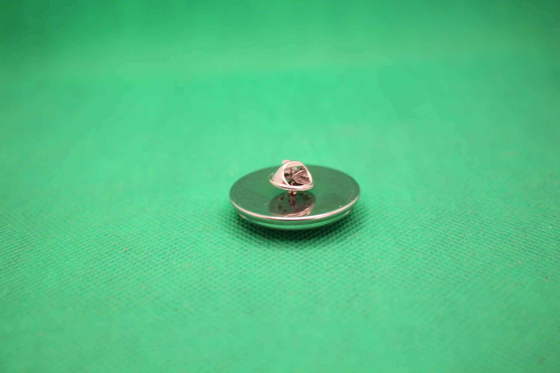 FIFA World Cup 2026 brooch pin with official logo image, side view of pin