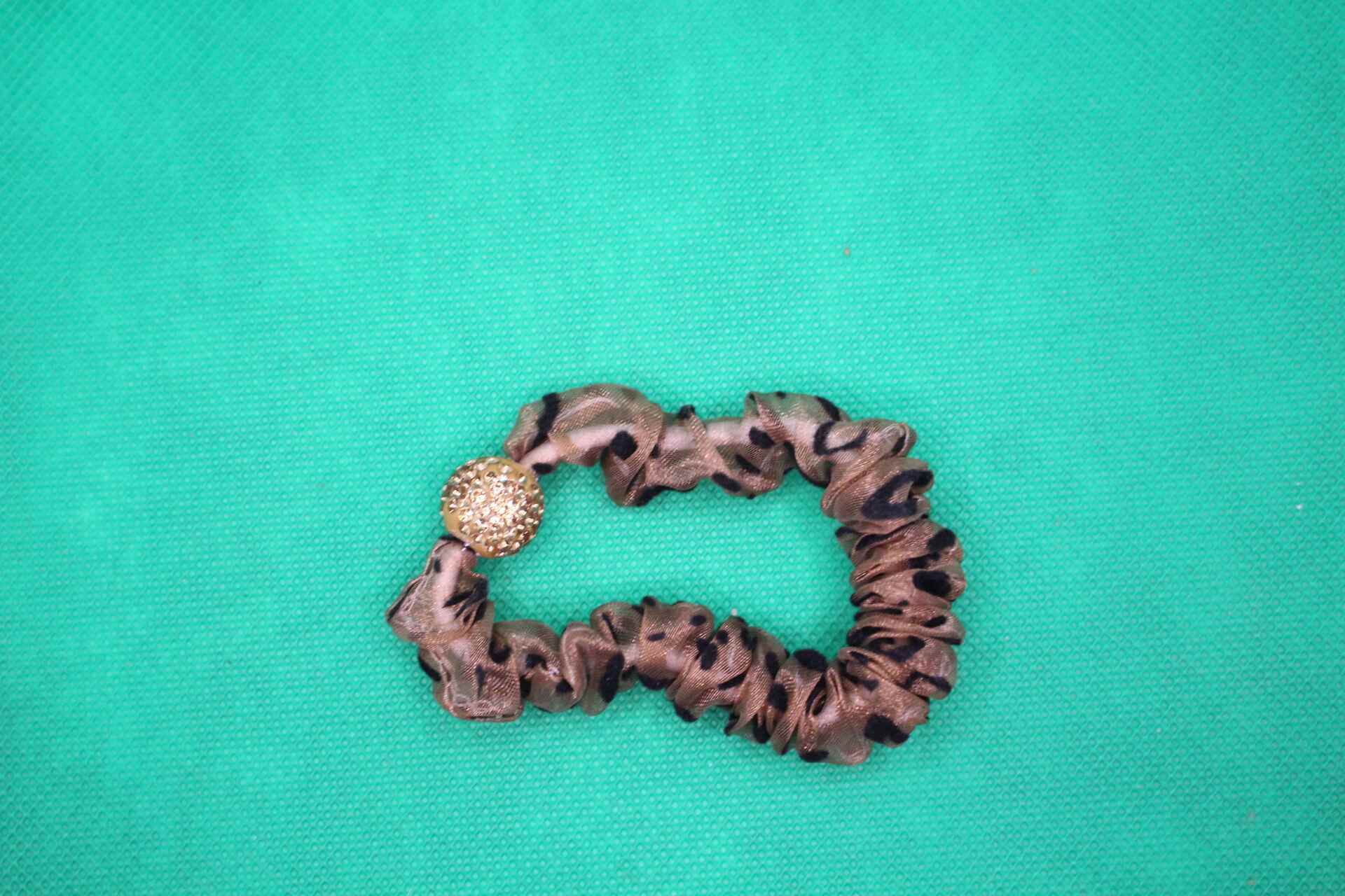 fancy hair tie overhead shot