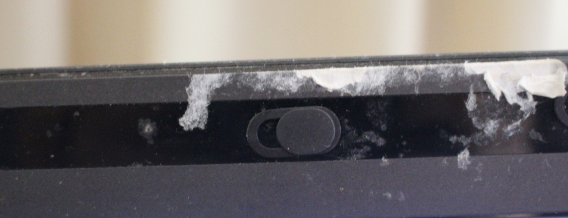 camera cover on laptop, with sticky residue left on laptop from stickers I used as covers in the past
