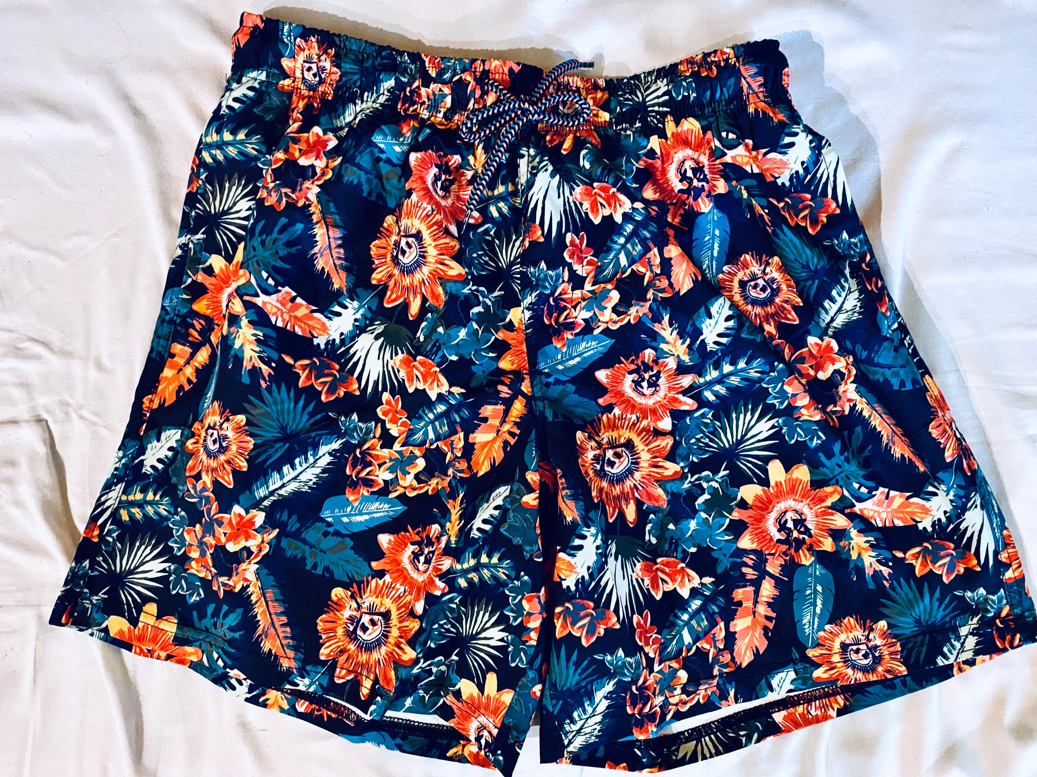Mountain Warehouse board shorts by themselves