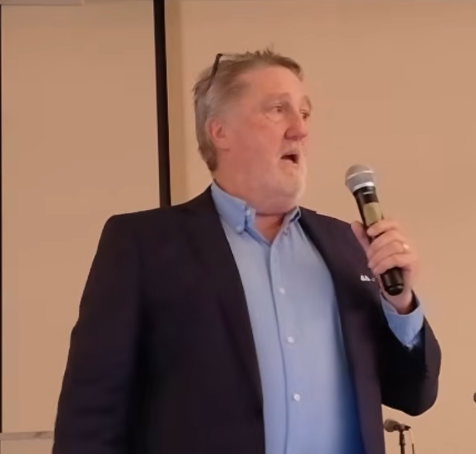 Larry Wood presenting during Day 2 of the Kingdom Billionaires Conference 2026