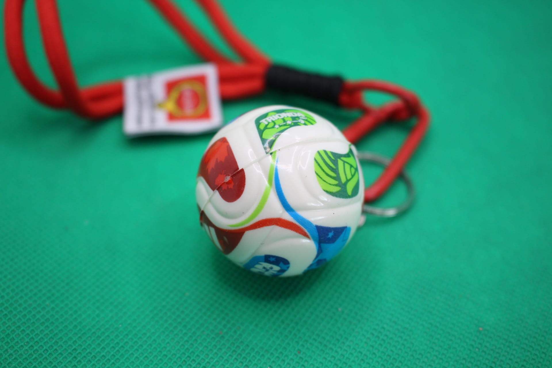 FIFA World Cup 2026 ball keychain, soccer ball focus, unaligned sections
