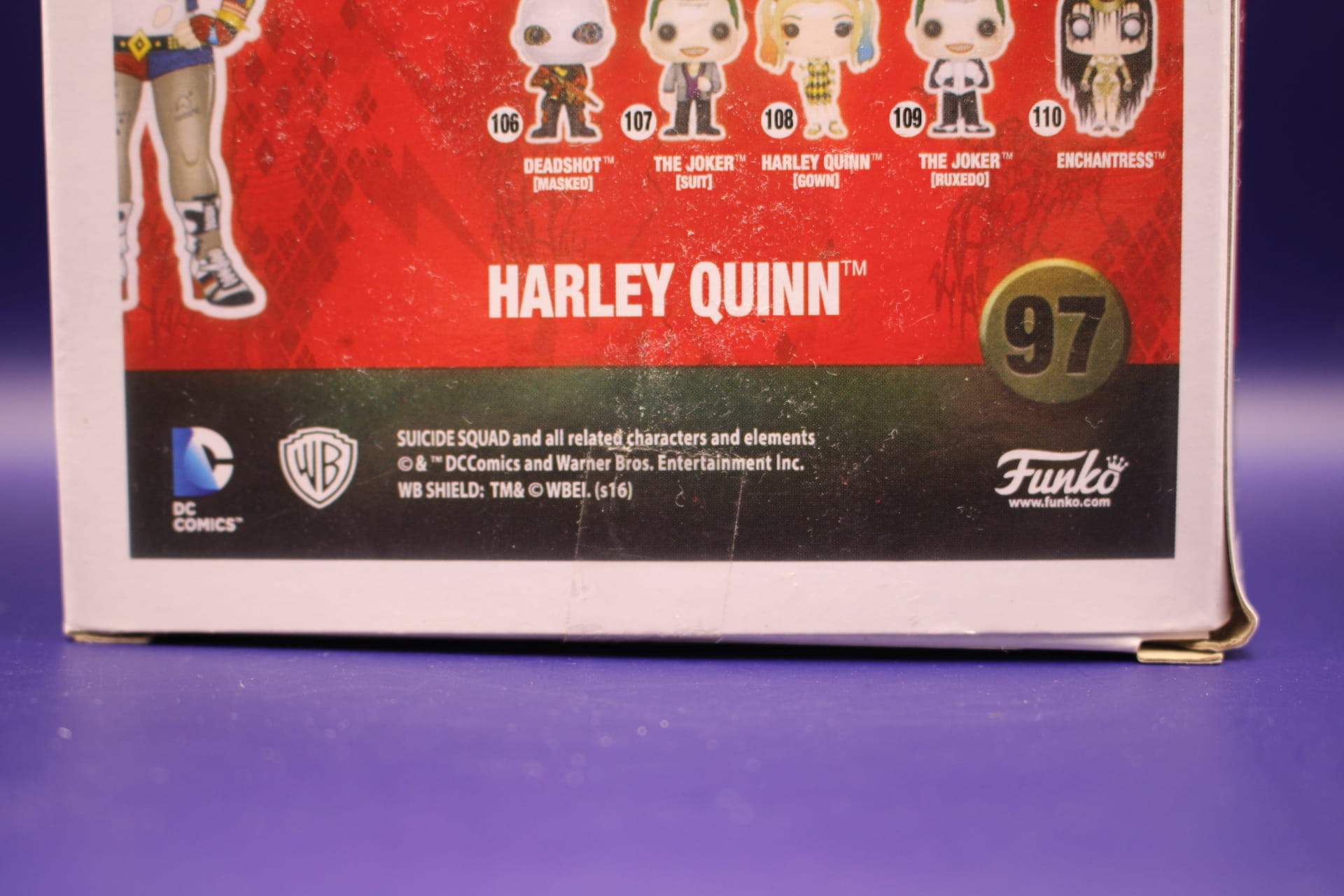 lower part of Harley Quinn Funko box