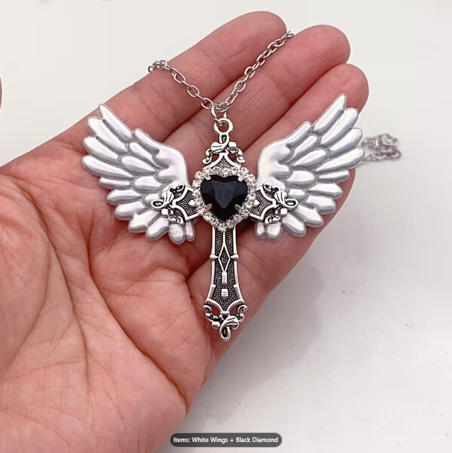 black cubic zirconia cross necklace, taken from Temu product page