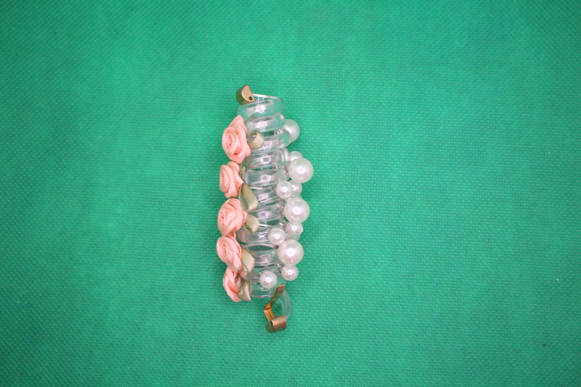 rose telephone cord hair side top view -- peach color