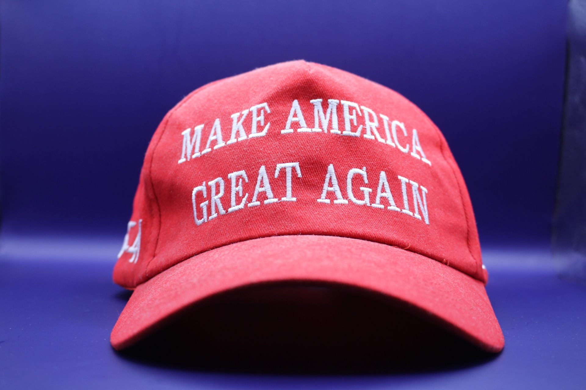 dented front of Make America Great Again caps from Temu