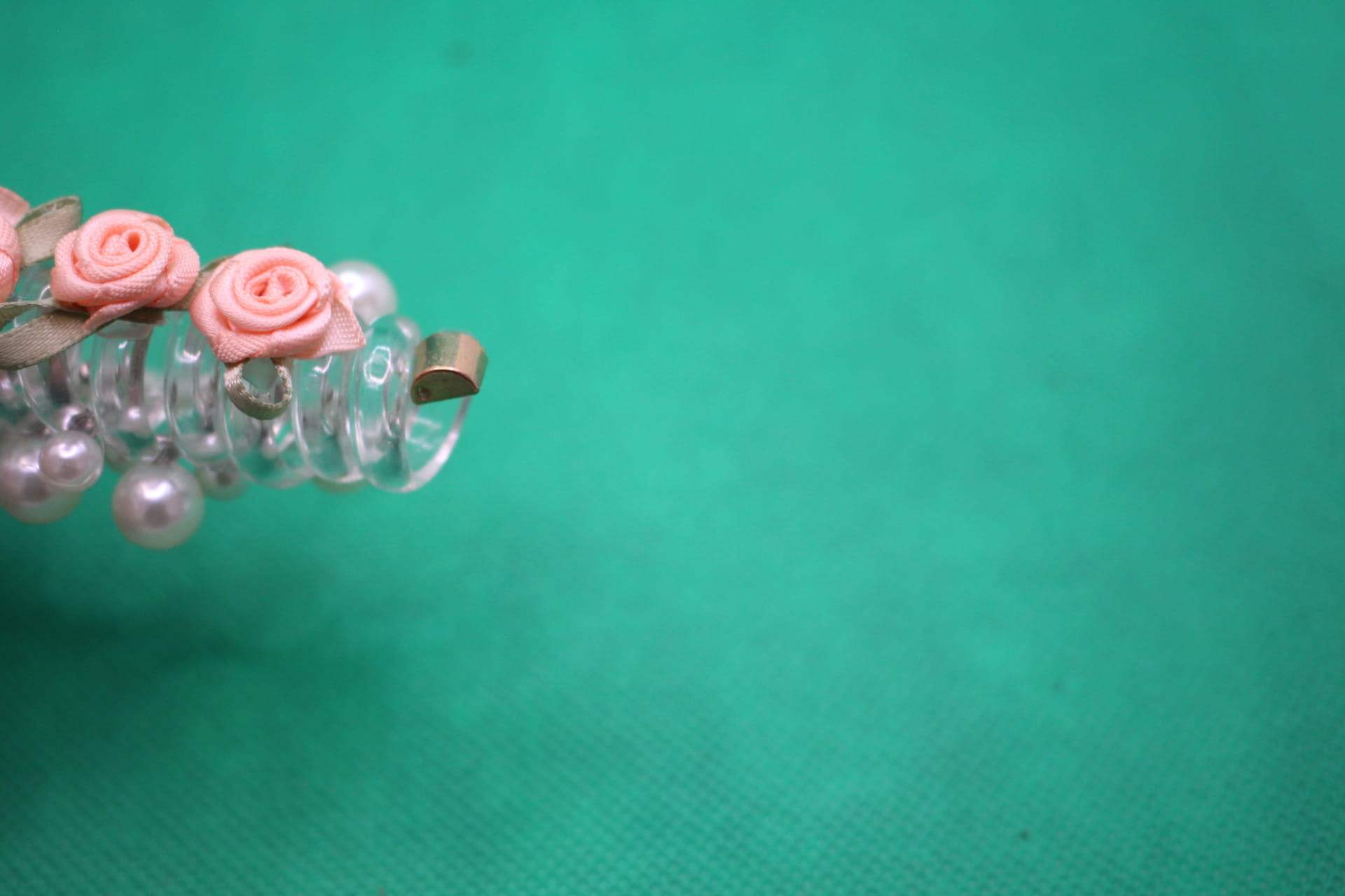 rose telephone cord hair tie end -- peach color