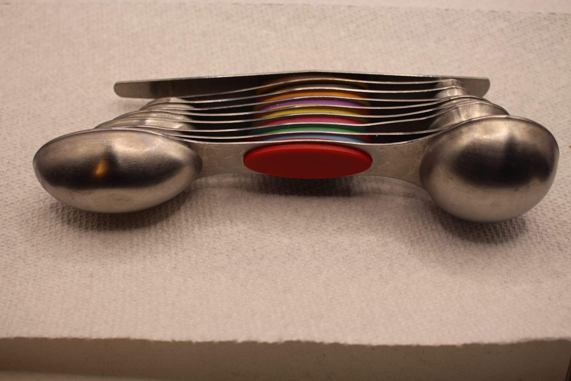 stackable magnetic measuring spoons set, showing bottoms of measuring spoons 