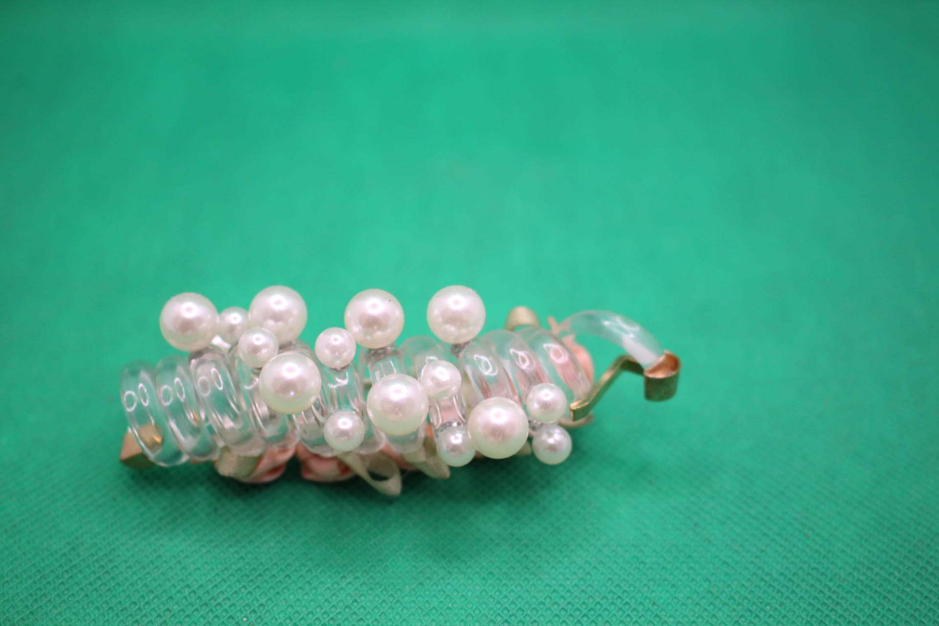 rose telephone cord hair tie bottom view -- peach color